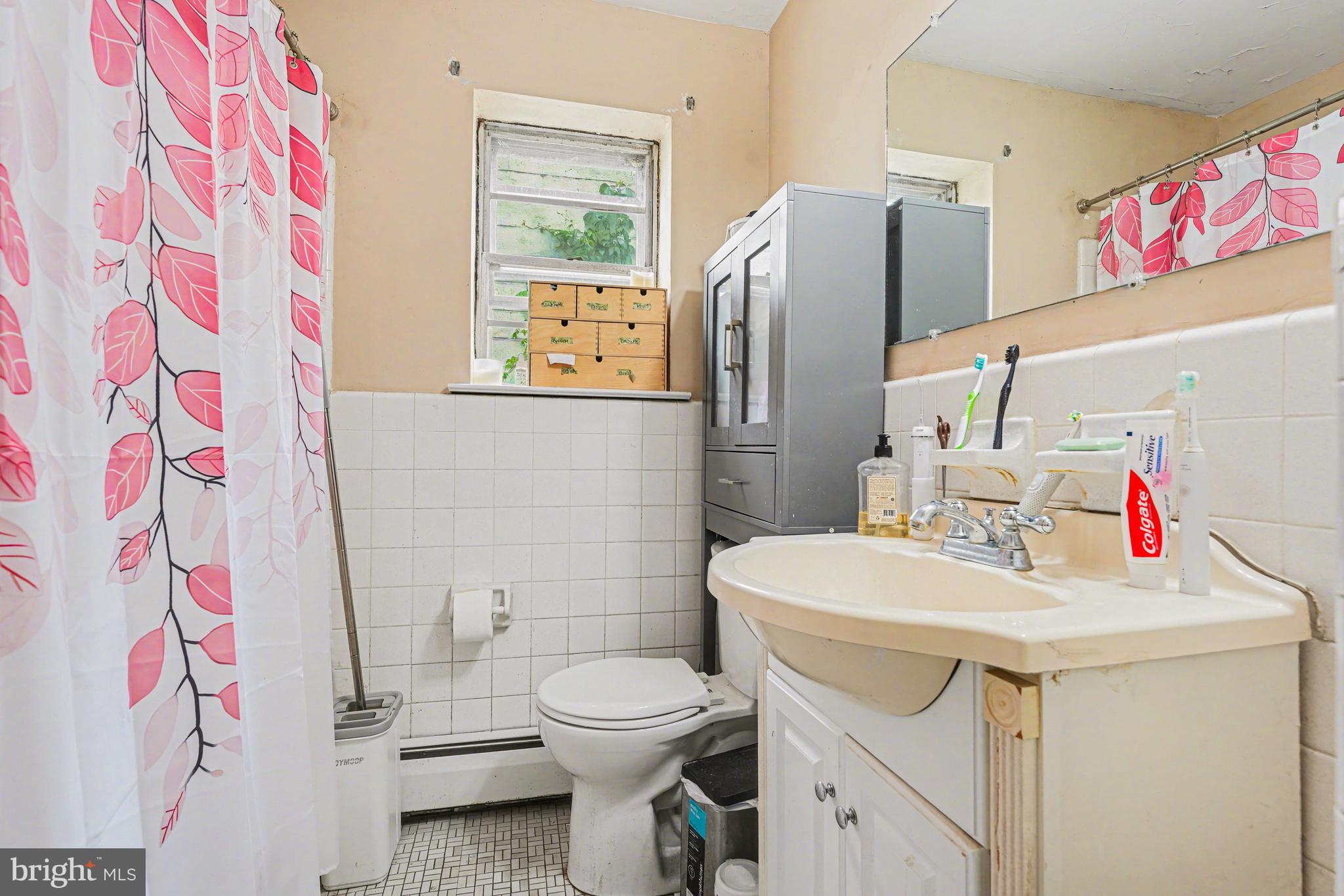 107 Allison Road Oreland, PA 19075 - Photo 25 of 54 a bathroom with a sink toilet and shower