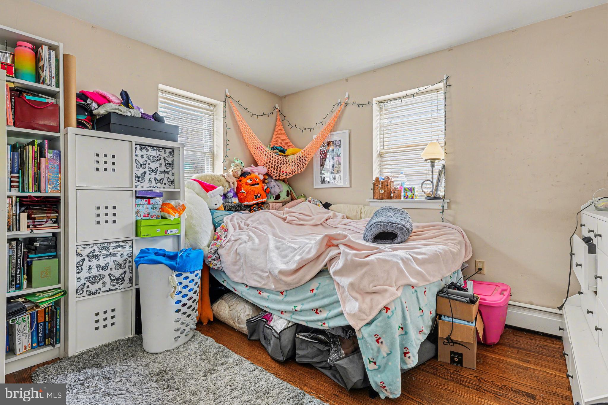 107 Allison Road Oreland, PA 19075 - Photo 27 of 54 a bedroom with a bed and a window