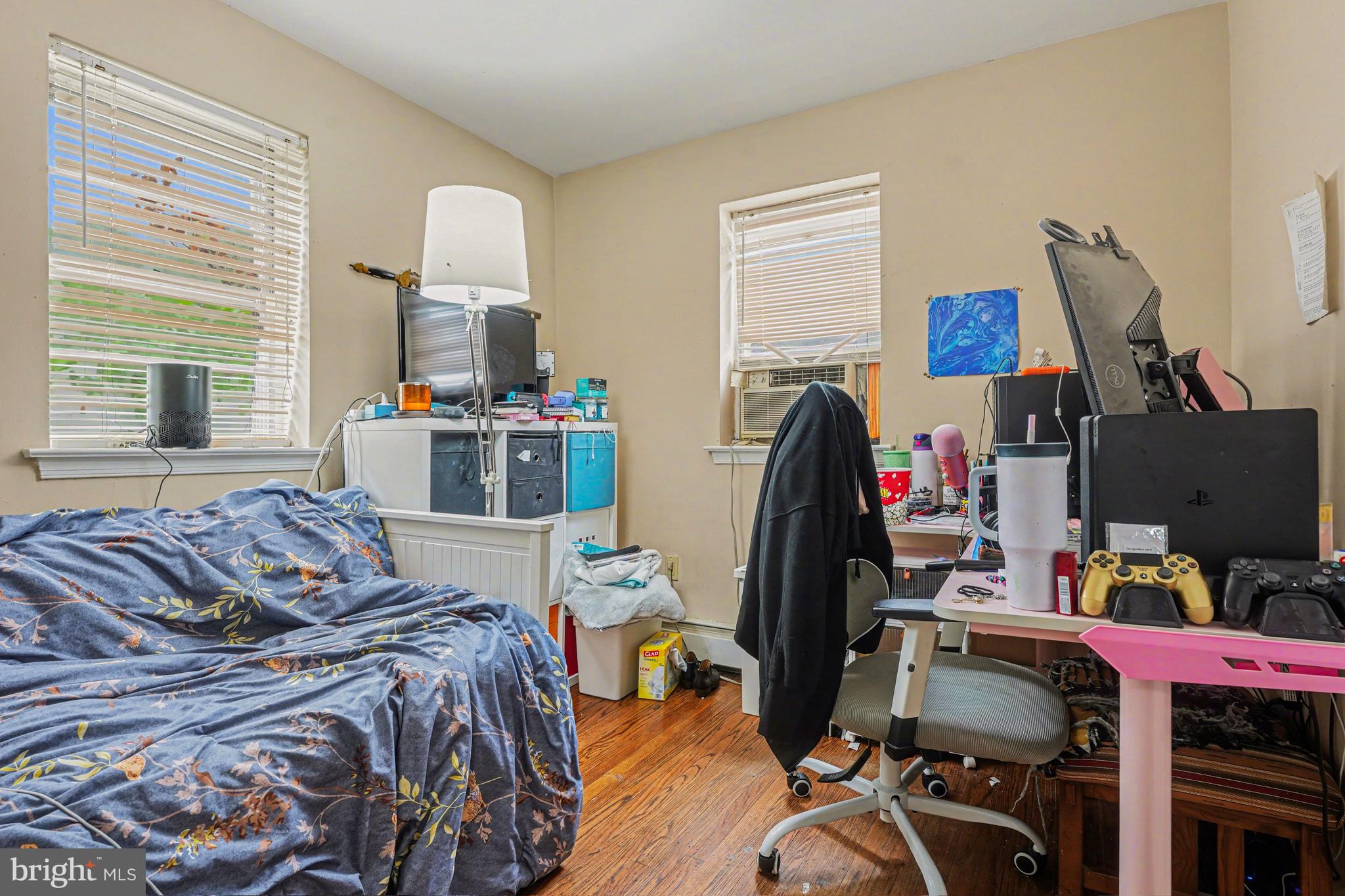 107 Allison Road Oreland, PA 19075 - Photo 43 of 54 a bed room with a bed and a window