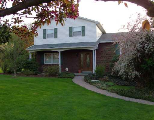 Exterior Front. Can you smell the blossoms?