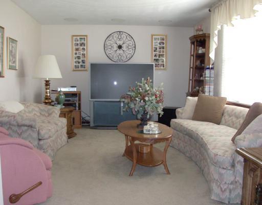 Living Room. This formal living room is current TV room with  built-in surround!  What do you want to use this room for?
