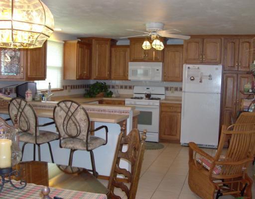 Kitchen. What a great kitchen, solid oak, ceramic floor and backsplash, plus all the other goodies!