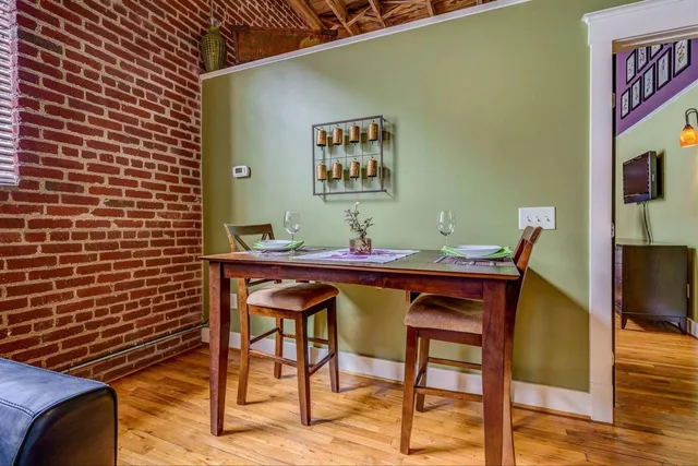 a view of a dining room with furniture