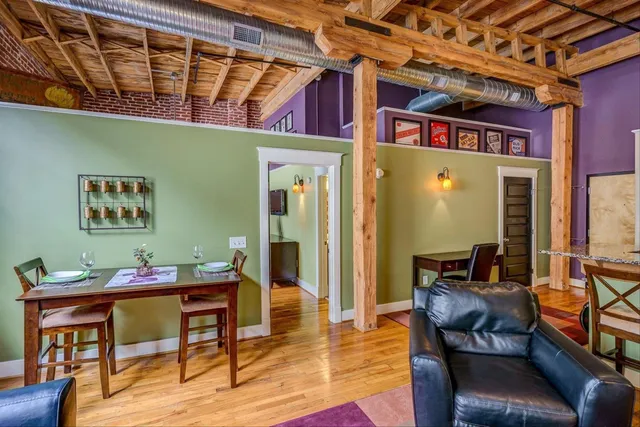a kitchen with sink and cabinets