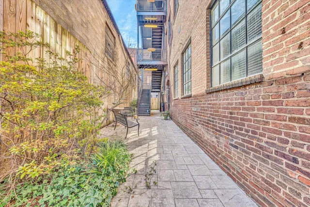 a view of a pathway along the city of building