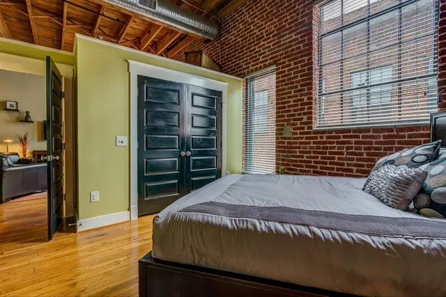 a blue bench sitting in front of a house