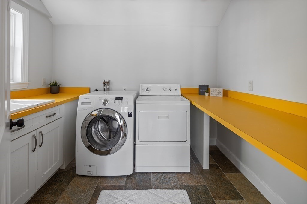 67 Randlett Park Newton, MA 02465 - Photo 14 of 41 a utility room with dryer and washer