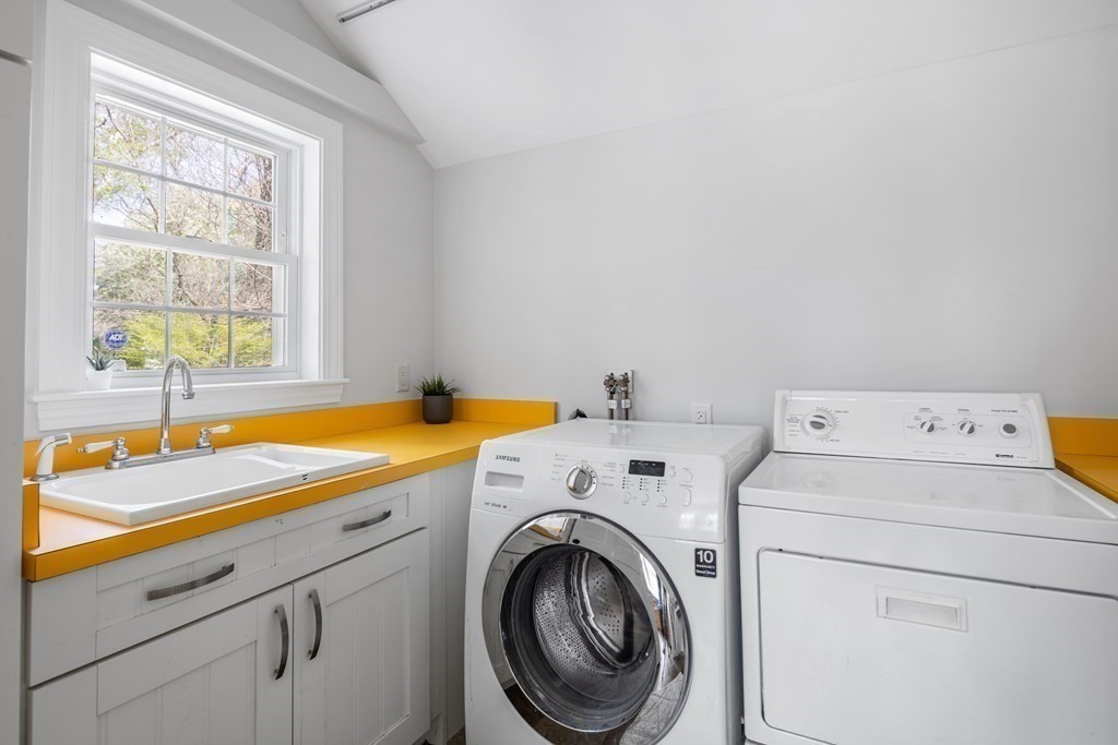 67 Randlett Park Newton, MA 02465 - Photo 15 of 41 a utility room with dryer and washer