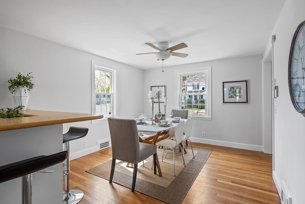 67 Randlett Park Newton, MA 02465 - Photo 28 of 41 a view of a dining room with furniture window and wooden floor
