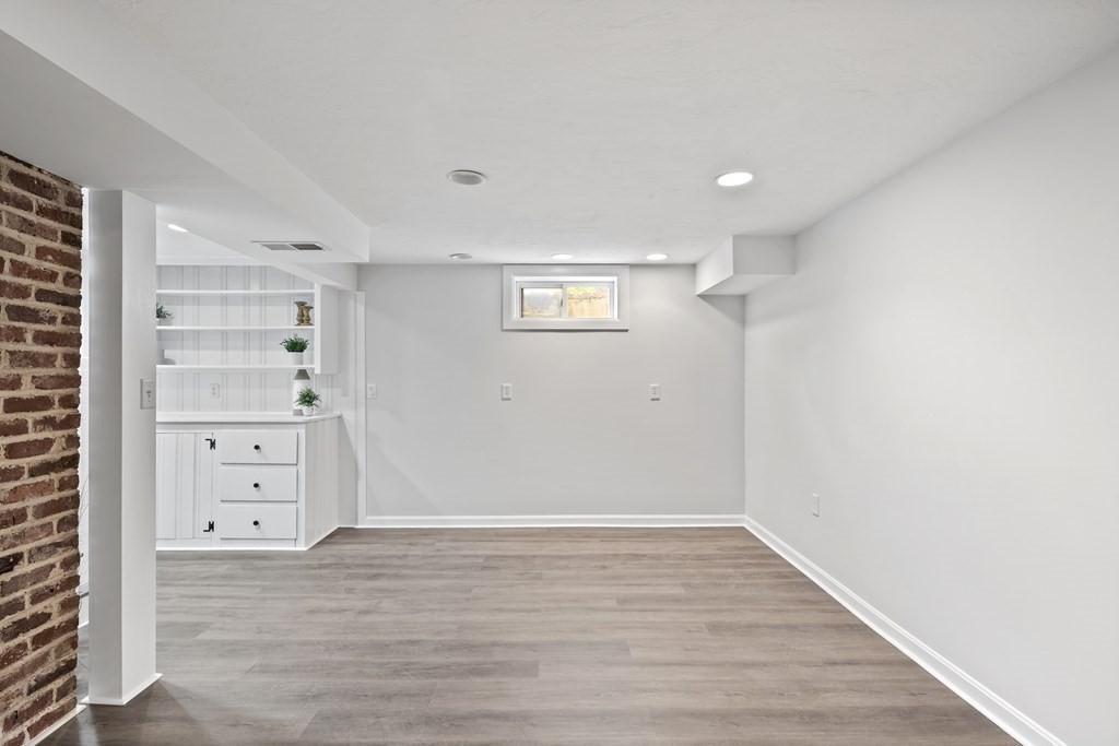 67 Randlett Park Newton, MA 02465 - Photo 32 of 41 wooden floor in an empty room