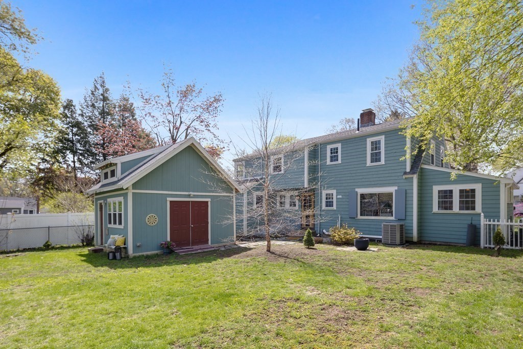 67 Randlett Park Newton, MA 02465 - Photo 33 of 41 a backyard of a house with table and chairs