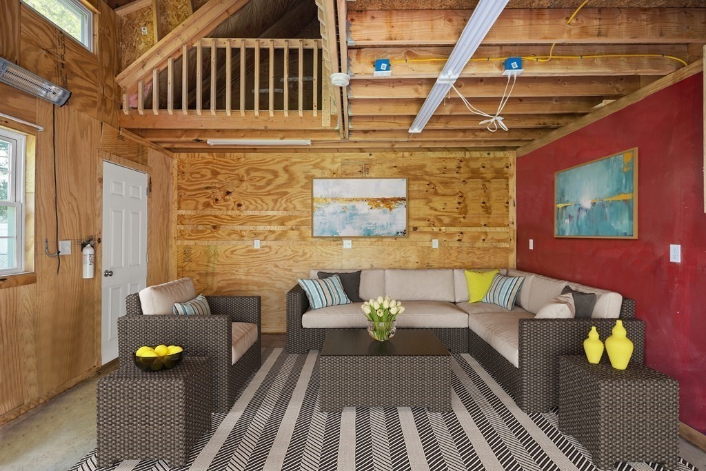 67 Randlett Park Newton, MA 02465 - Photo 35 of 41 a view of a patio with couches and chairs with wooden floor