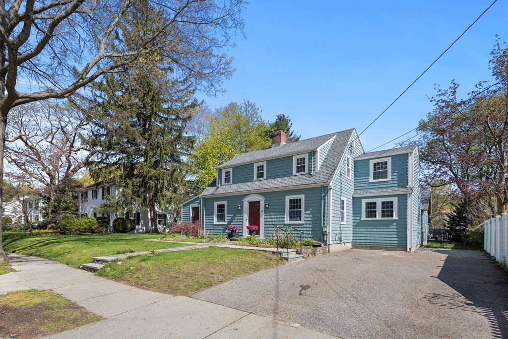 67 Randlett Park Newton, MA 02465 - Photo 40 of 41 a front view of house with yard and green space