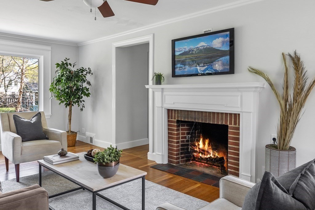 67 Randlett Park Newton, MA 02465 - Photo 5 of 41 a living room with furniture and a fireplace