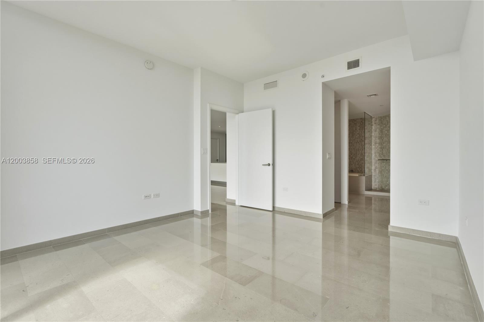 88 Southwest 7th Street, Unit 3710 Miami, FL 33130 - Photo 11 of 21 wooden floor in an empty room