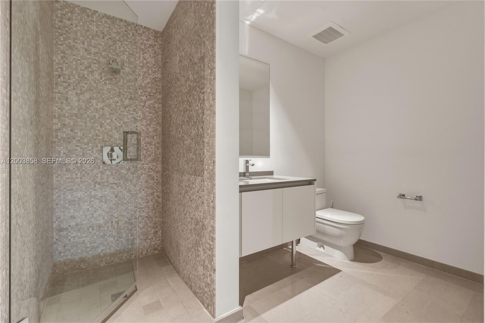 88 Southwest 7th Street, Unit 3710 Miami, FL 33130 - Photo 21 of 21 a bathroom with a toilet and a shower