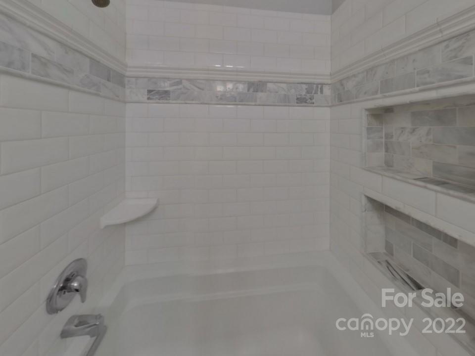 1012 Queens Road Charlotte, NC 28207 - Photo 10 of 13 a bathroom with a shower