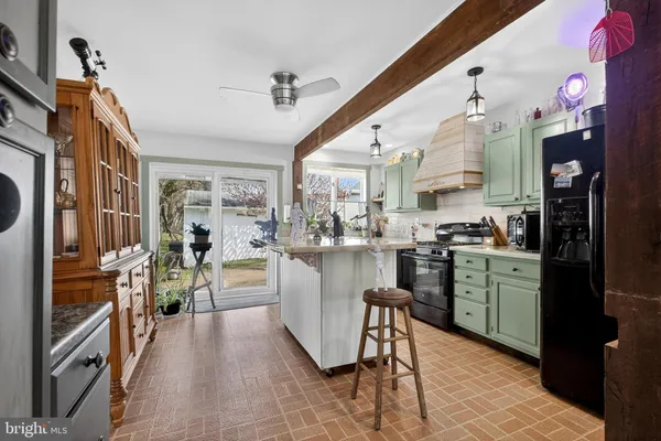 a kitchen with counter top space and appliances