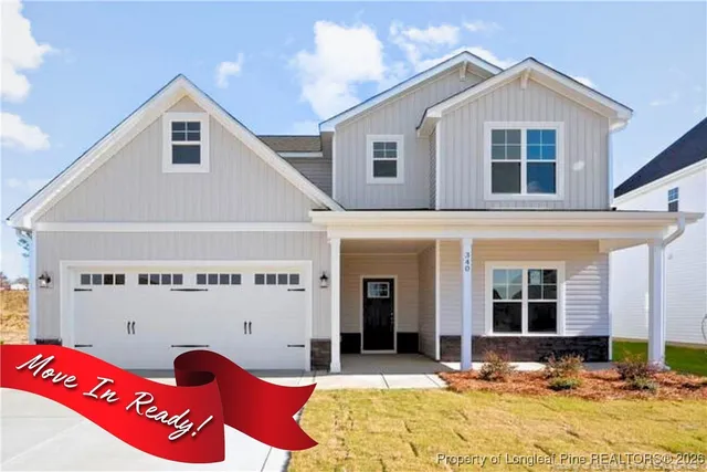 a front view of a house with glass windows