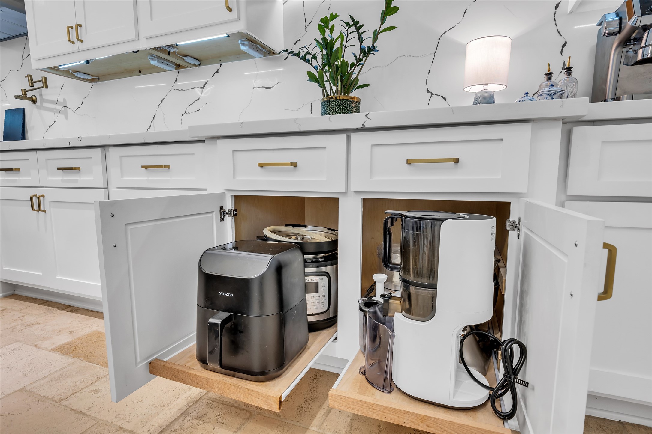 143 West Valera Ridge Place Spring, TX 77389 - Photo 17 of 50 Each cabinet in the kitchen has rolling drawers.