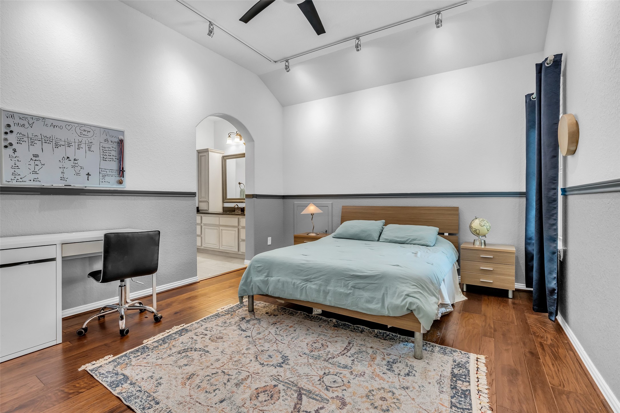 143 West Valera Ridge Place Spring, TX 77389 - Photo 25 of 50 a bedroom with a bed a desk and chair