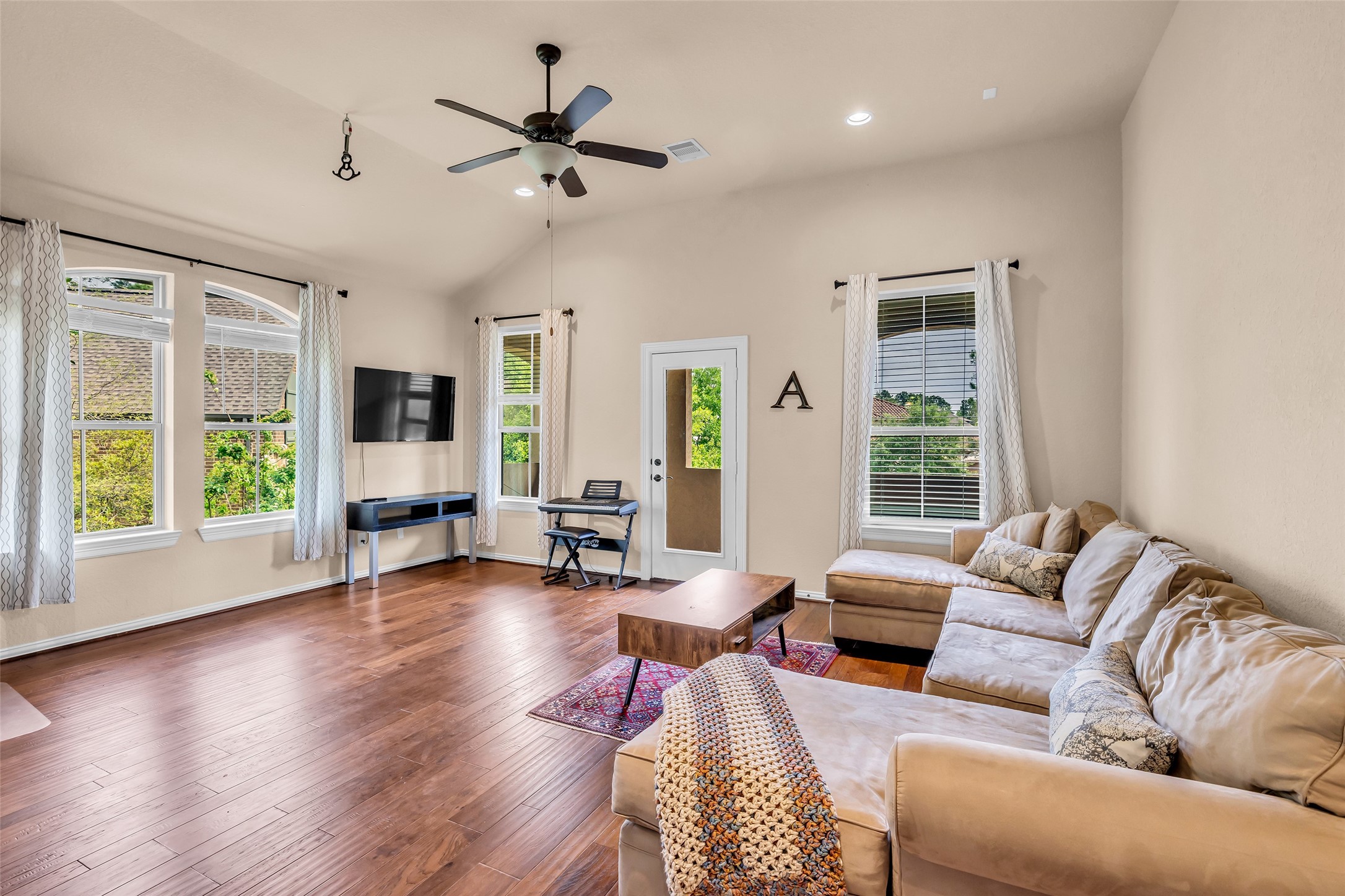 143 West Valera Ridge Place Spring, TX 77389 - Photo 30 of 50 a living room with furniture and wooden floor