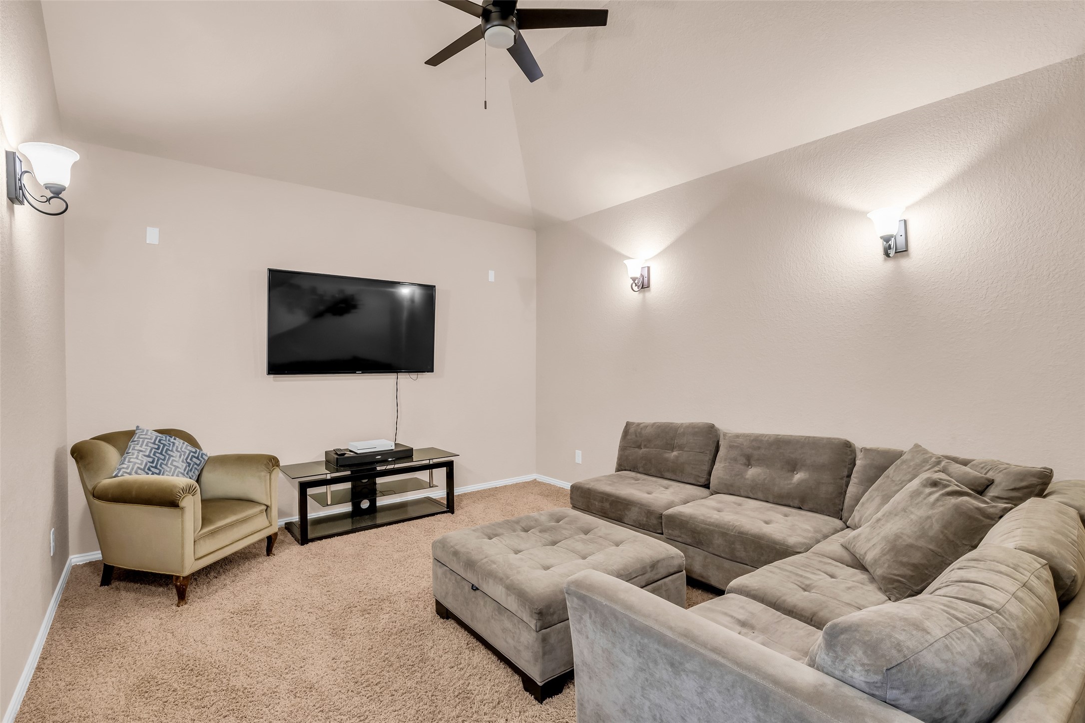 143 West Valera Ridge Place Spring, TX 77389 - Photo 31 of 50 a living room with furniture and a flat screen tv