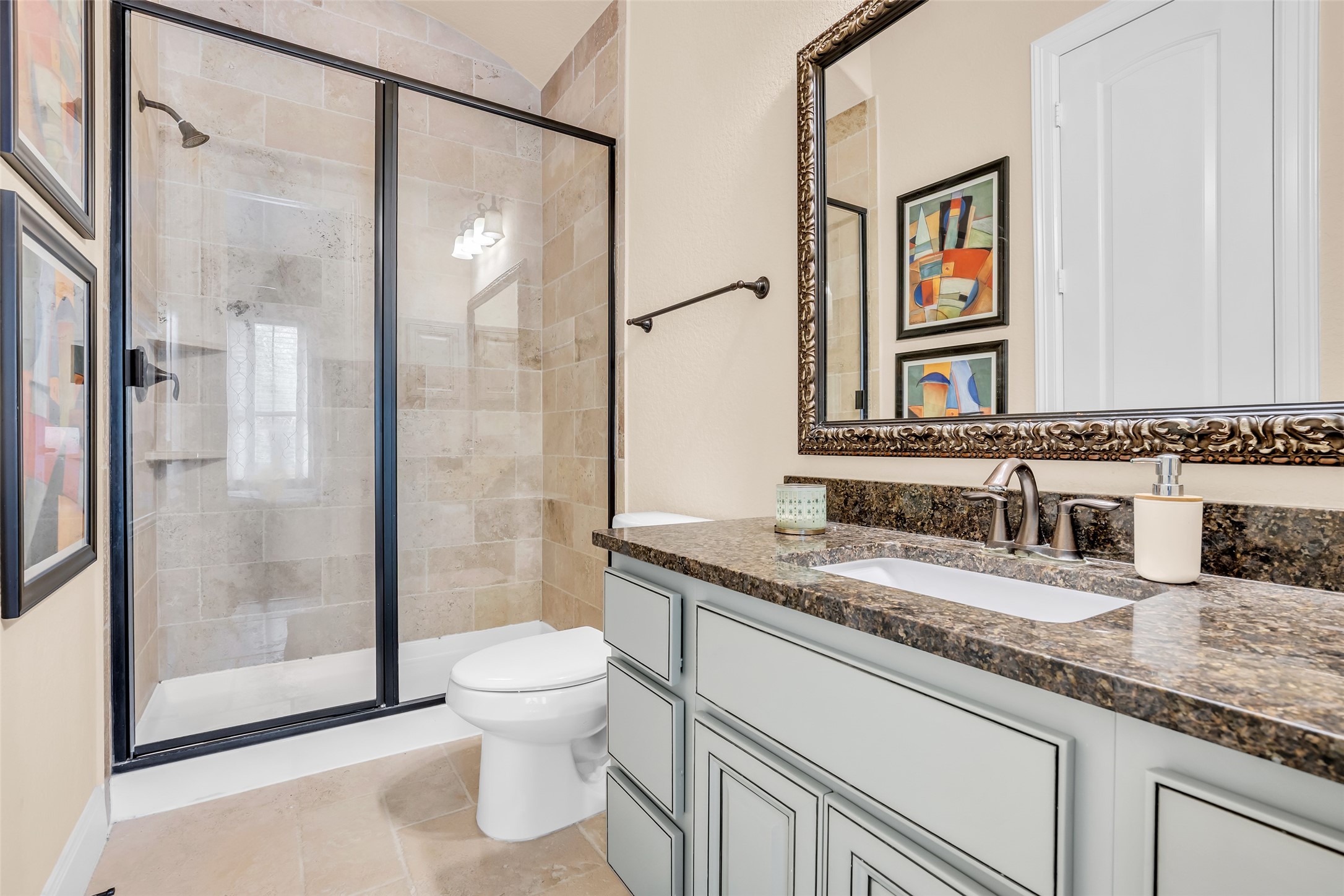 143 West Valera Ridge Place Spring, TX 77389 - Photo 33 of 50 a bathroom with a granite countertop sink mirror vanity and toilet