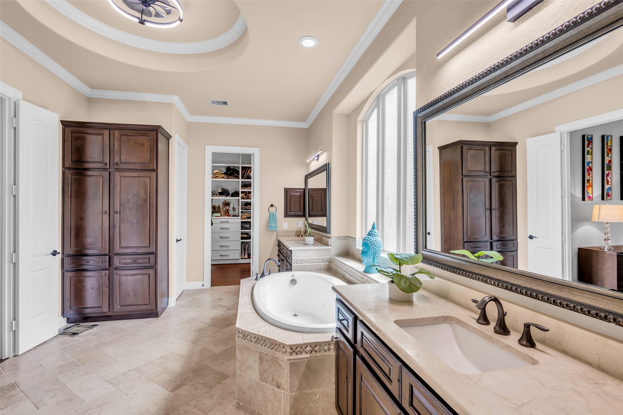 143 West Valera Ridge Place Spring, TX 77389 - Photo 35 of 50 a bathroom with a sink double vanity and a shower