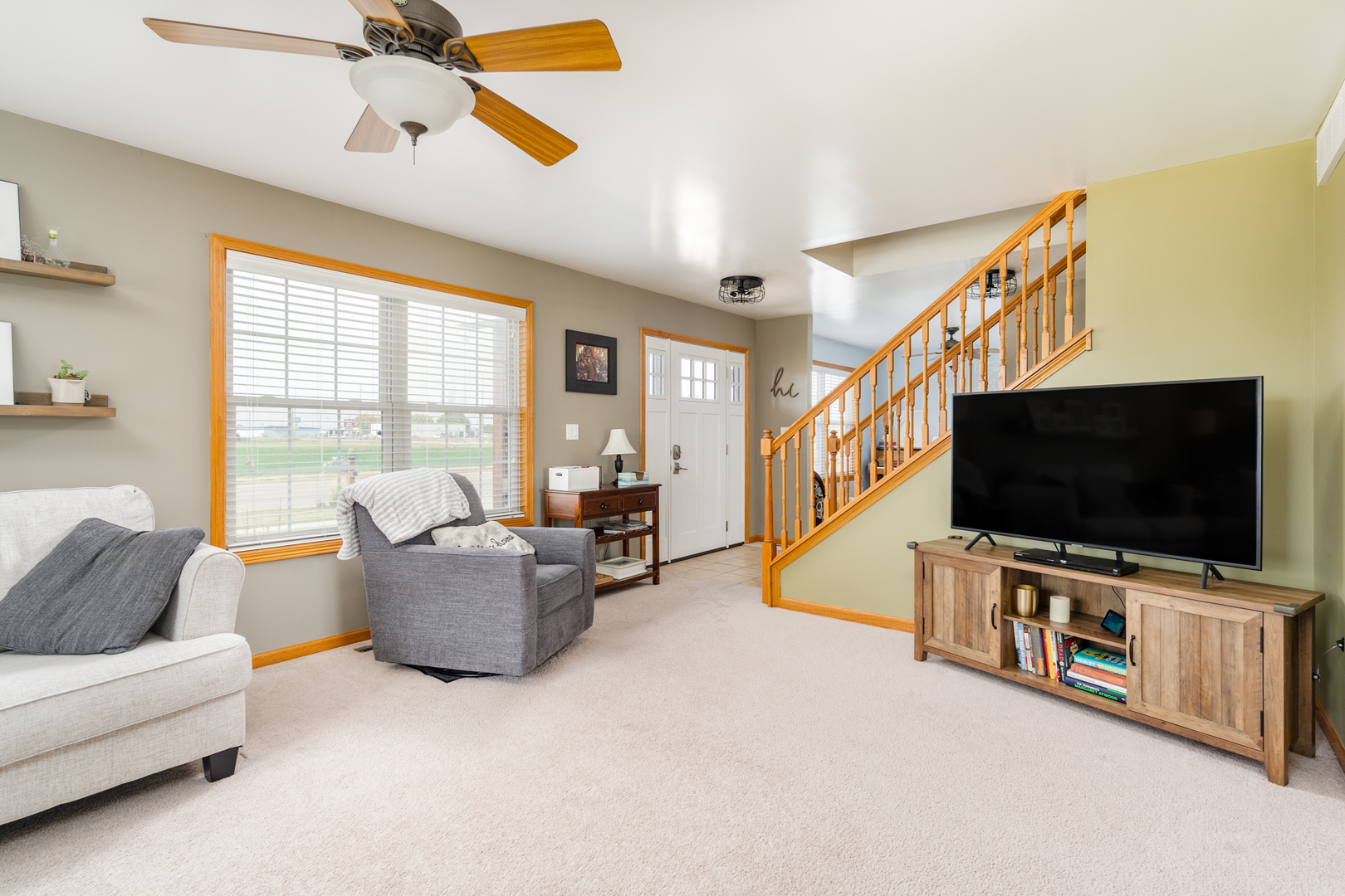 3421 Marquette Road Peru, IL 61354 - Photo 12 of 41 a living room with furniture and a flat screen tv