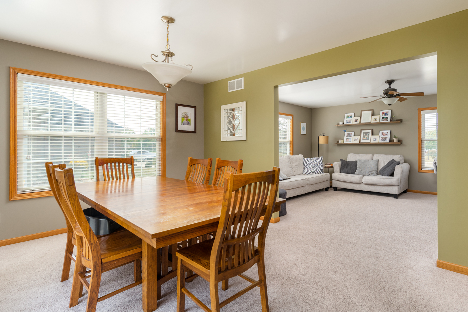 3421 Marquette Road Peru, IL 61354 - Photo 17 of 41 a view of a dining room with furniture and a chandelier