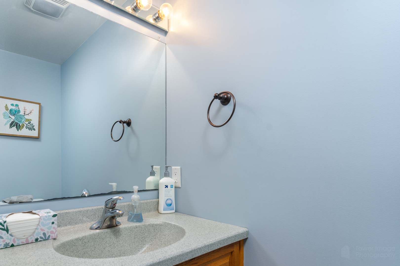 3421 Marquette Road Peru, IL 61354 - Photo 22 of 41 a bathroom with a sink and a mirror