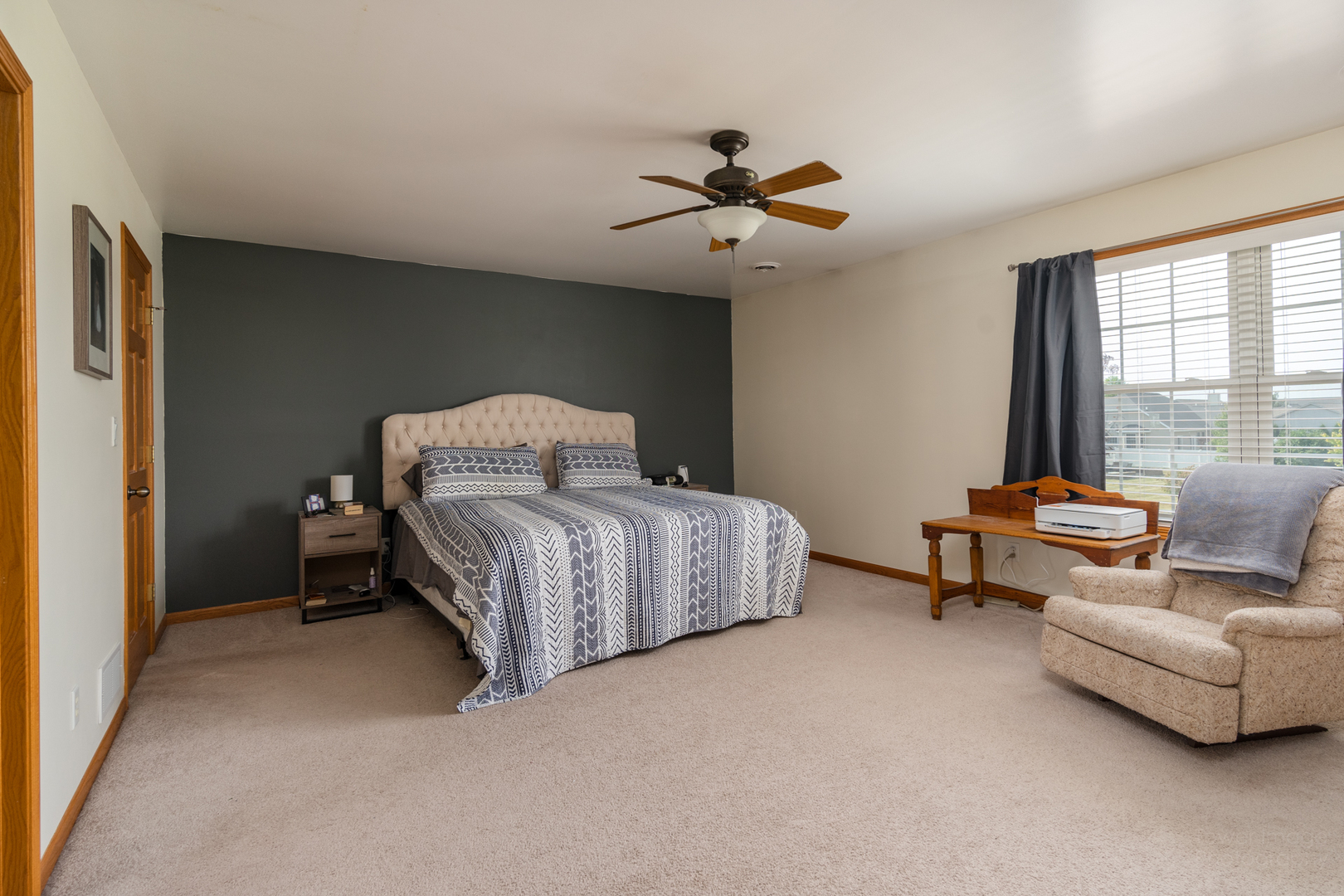 3421 Marquette Road Peru, IL 61354 - Photo 24 of 41 a bedroom with a bed couch and window