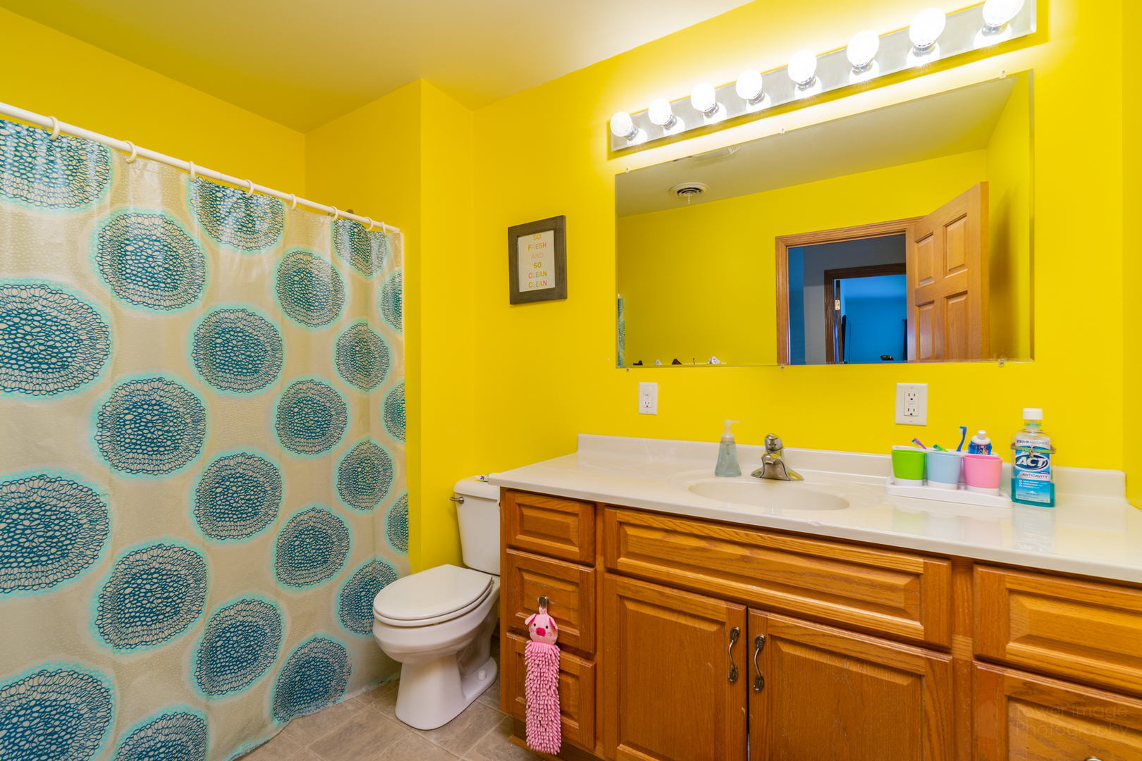 3421 Marquette Road Peru, IL 61354 - Photo 30 of 41 a bathroom with a sink and a mirror