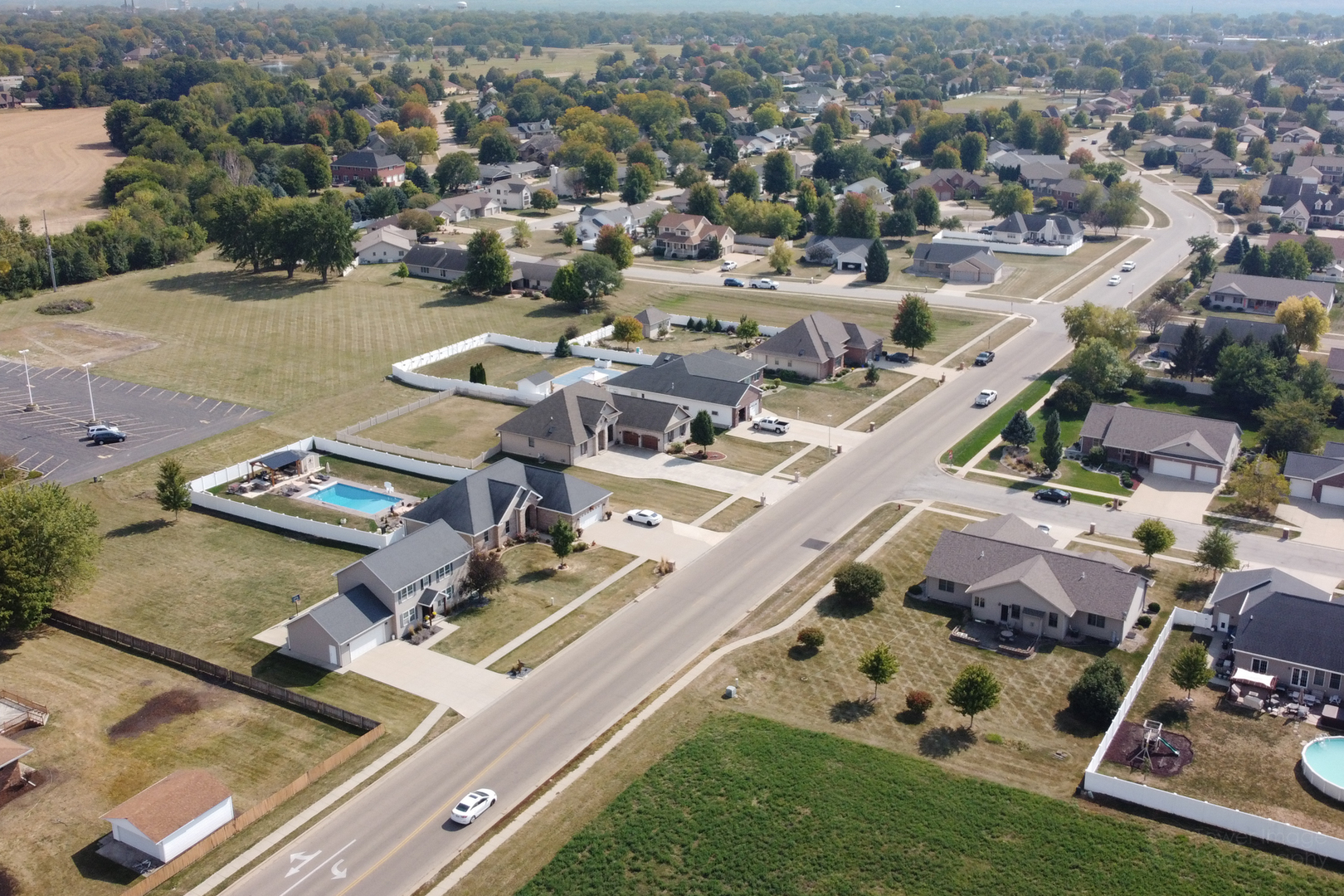 3421 Marquette Road Peru, IL 61354 - Photo 8 of 41 an aerial view of a swimming pool and lake view