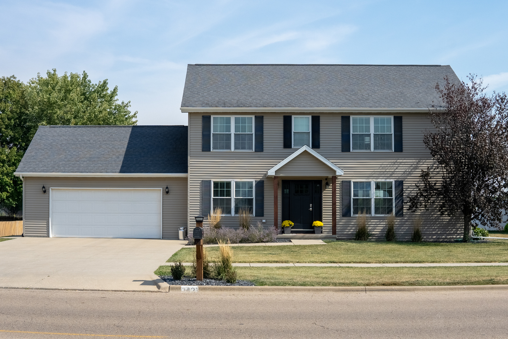 3421 Marquette Road Peru, IL 61354 - Photo 9 of 41 a front view of a house with a garden