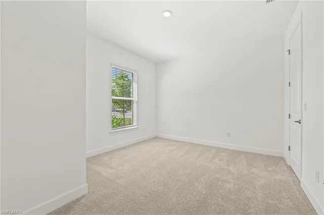 an empty room with window