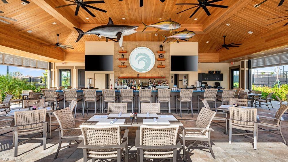 15517 Vittorio Street Naples, FL 34114 - Photo 32 of 35 View of patio / terrace with a ceiling fan and exterior bar