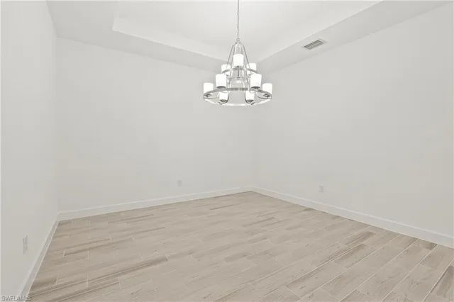 a view of a chandelier in a room