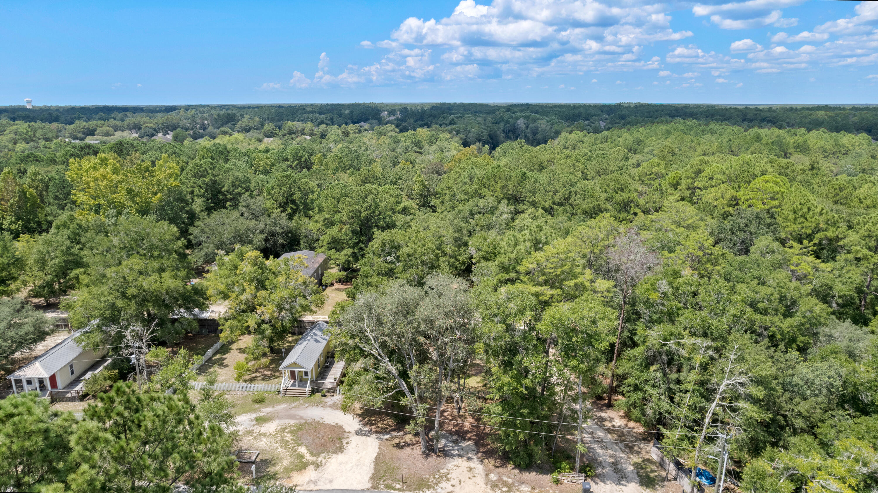 161 Caswell Branch Road Freeport, FL 32439 - Photo 14 of 15 a view of a green field