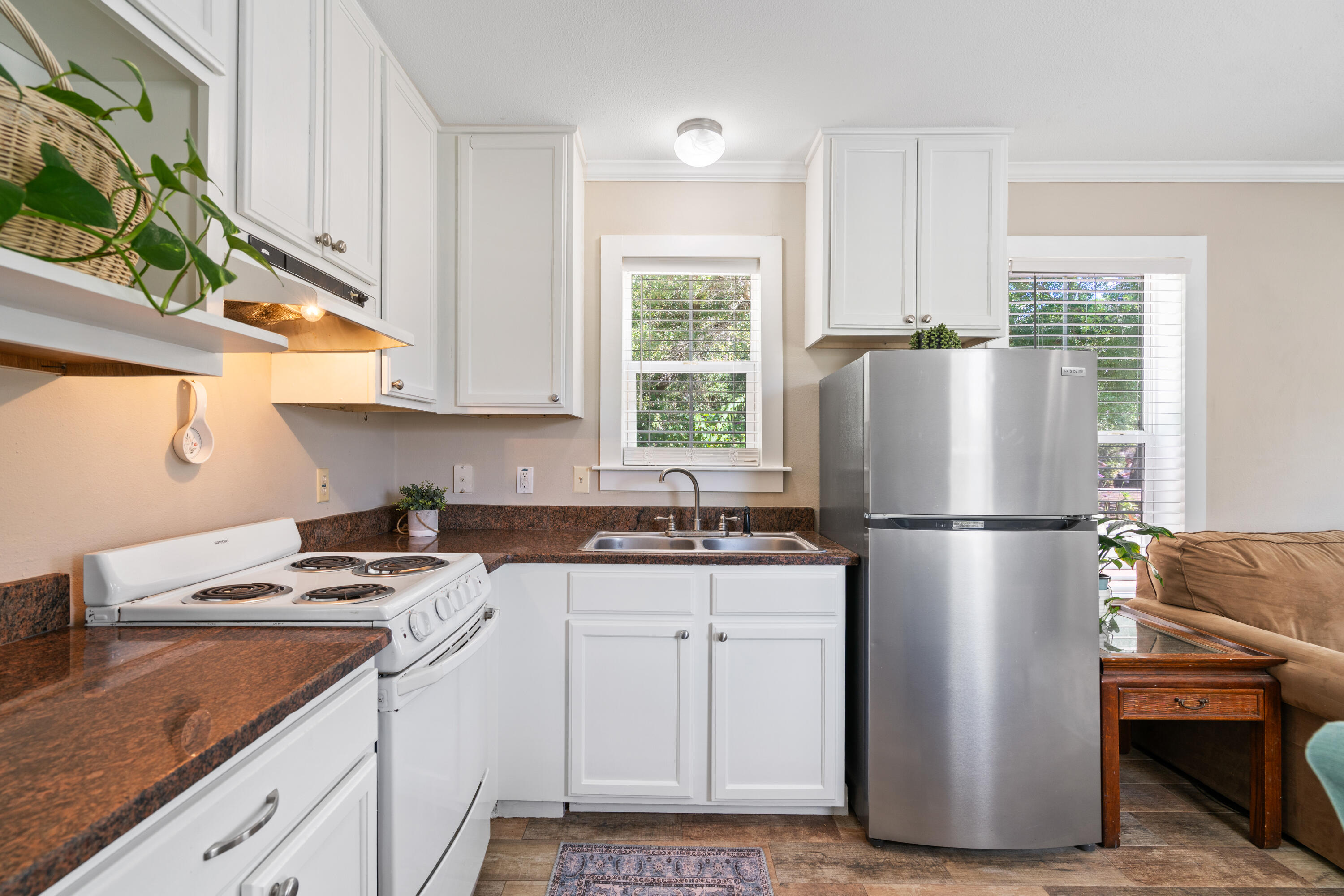 161 Caswell Branch Road Freeport, FL 32439 - Photo 9 of 15 a white refrigerator freezer sitting in a kitchen