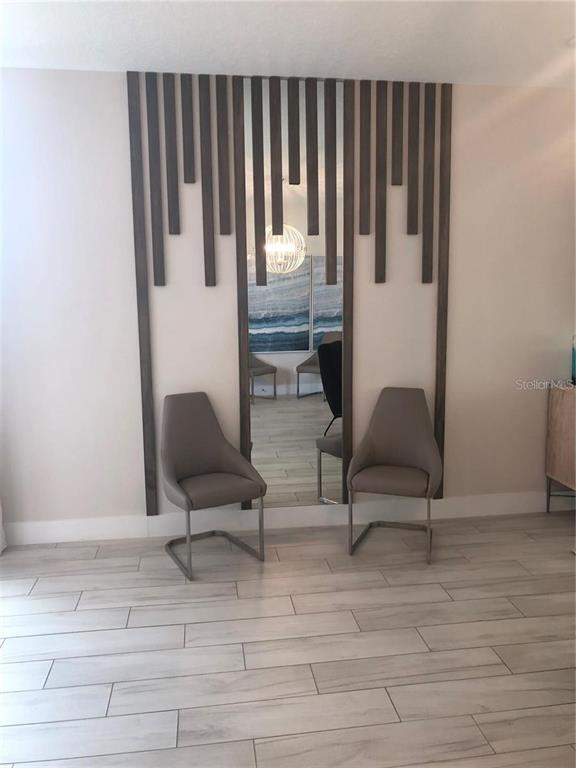 820 Driving Range Court Reunion, FL 34747 - Photo 16 of 45 a view of entryway with wooden floor