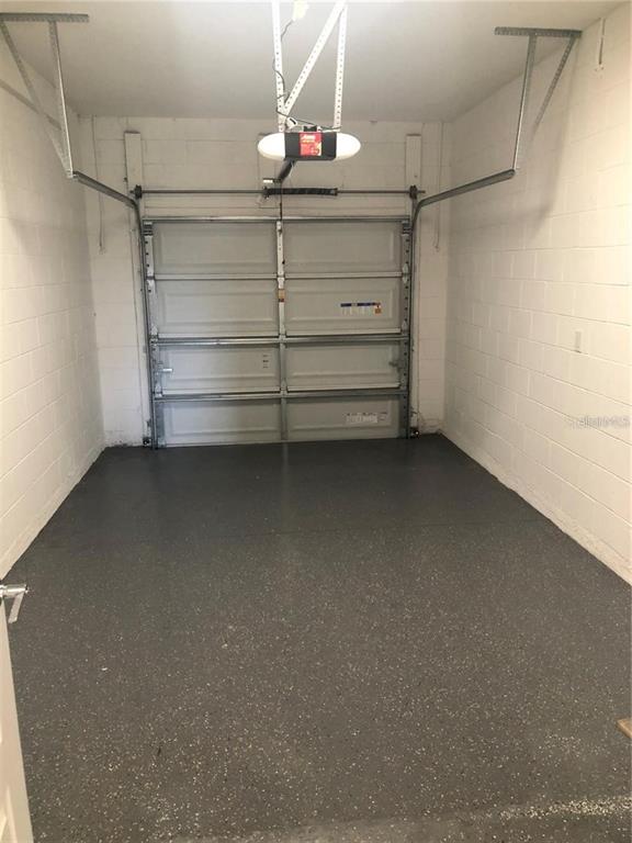 820 Driving Range Court Reunion, FL 34747 - Photo 33 of 45 a view of a store room with racks