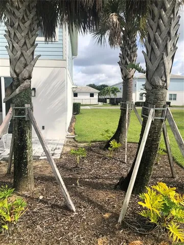 a view of a yard with swimming pool