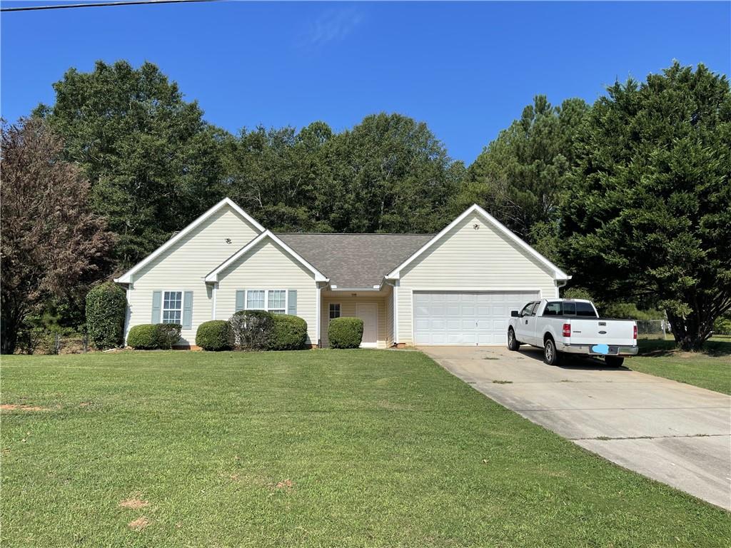 468 Old Tree Drive Jackson, GA 30233 - Photo 1 of 1 a view of front of a house with yard and trees