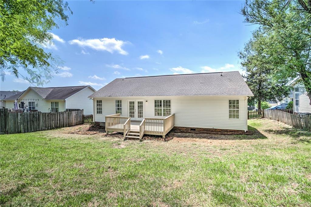 1022 Piney Church Road Concord, NC 28025 - Photo 16 of 16 a view of a house with backyard and sitting area