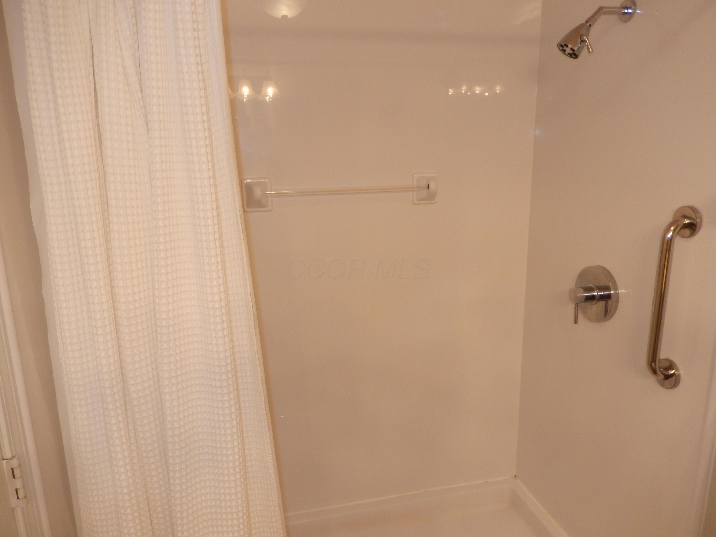 3941 Karl Road, Unit 322 Columbus, OH 43224 - Photo 21 of 42 Full bath with shower stall