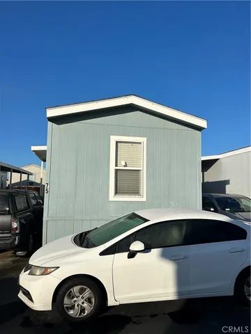 a car parked in front of a house