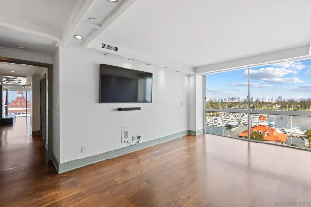 a view of a livingroom with wooden floor