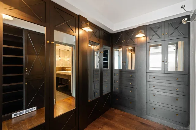 a bathroom with a toilet and shower